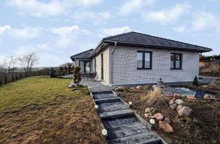 Haus kaufen in 23701 Süsel, Durchatmen & genießen: Moderner Bungalow mit sonniger Terrasse und Blick in die Natur!