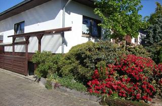 Haus kaufen in 56290 Dommershausen, Besser wohnen im Bungalow - Großzügigkeit auf einer Ebene mit zusätzlichem Wohnpotenzial