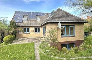 Haus kaufen in 24107 Suchsdorf, Kiel-Suchsdorf: Gepflegter Winkelbungalow in ruhiger Sackgassenlage mit großem Garten und Vollkeller