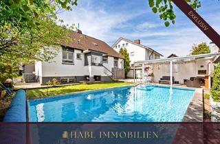 Haus kaufen in 63150 Heusenstamm, Habl Immobilien - Familienglück mit Garten, Pool und Saunalandschaft