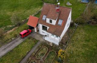 Einfamilienhaus kaufen in 36381 Schlüchtern, Modernisiert & Wohlfühlcharakter: Einfamilienhaus mit großem Garten in Schlüchtern-Hutten