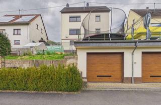 Mehrfamilienhaus kaufen in 54579 Üxheim, Freistehendes Mehrfamilienhaus mit 3 Wohnungen & 2 Garagen In Guter naturnahe Lage von Üxheim/Ahütte
