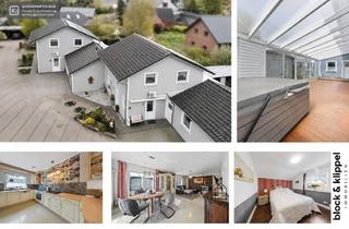 Einfamilienhaus kaufen in 24634 Arpsdorf, Ruhe genießen in Arpsdorf: Modernes Einfamilienhaus mit Wintergarten und 3 Garagen
