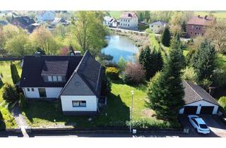 Haus kaufen in 31188 Holle, Großzügiges Zweifamilienhaus in beliebter Lage von Holle