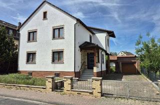 Einfamilienhaus kaufen in 61118 Bad Vilbel, Charmantes Einfamilienhaus mit großem Grundstück und viel Potenzial