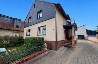 Haus kaufen in 63322 Rödermark, Rödermark - Seltene Gelegenheit in Urberach: Zwei charmante Einfamilienhäuser auf großzügigem Grundstück