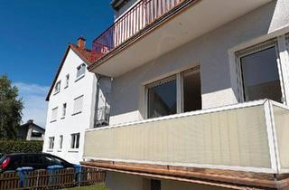 Wohnung kaufen in 64839 Münster, Münster (Hessen) - Modernisierte 3-Zimmer-Wohnung mit 2 Balkonen & Garage