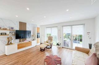 Wohnung kaufen in 35516 Münzenberg, MODERNE GARTENWOHNUNG MIT TERRASSE & KOMFORT Ruhiges Wohnen in gepflegter Umgebung in Münzenberg!