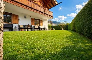 Wohnung kaufen in 83700 Rottach-Egern, Stilvolle Gartenwohnung mit sonnigem Süd-/Westgarten und alpinem Wohngefühl in absolut ruhiger Lage