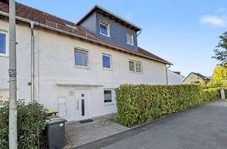 Wohnung kaufen in 60437 Nieder-Eschbach, Charmante Dachgeschosswohnung als Kapitalanlage in Frankfurt-Nieder-Eschbach