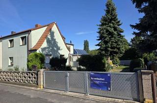 Doppelhaushälfte kaufen in 04425 Taucha, Doppelhaushälfte mit Garten und Keller in Taucha