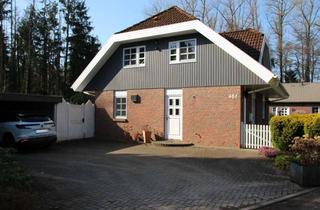 Einfamilienhaus kaufen in 21255 Tostedt, Besonderes Einfamilienhaus mit neuer Heizung (2026) und Doppelcarport in Waldrandlage