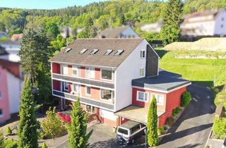 Mehrfamilienhaus kaufen in 63619 Bad Orb, Mehrfamilienhaus mit Gewerbe-Praxis-Fläche in Bad Orb – Renditeobjekt mit 4 Einheiten + Gewerbefl.