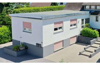 Einfamilienhaus kaufen in 63594 Hasselroth, Einfamilienhaus mit effizienter Wärmepumpe und 2 Pkw-Stellplätzen in ruhiger Lage Niedermittlau