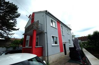 Haus kaufen in 55283 Nierstein, Modernisiertes Zweifamilienhaus im Herzen von Nierstein