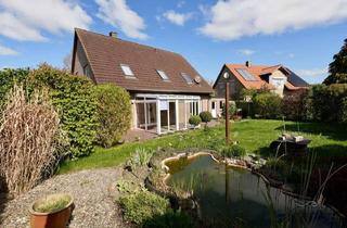 Einfamilienhaus kaufen in 23730 Neustadt, Sehr gepflegtes Einfamilienhaus in ruhiger Spielstraße mit großem Garten, Kamin & Ostseenähe