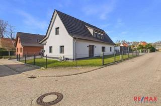 Haus kaufen in 29664 Walsrode, Kernsanierte Immobilie mit barrierearmem Erdgeschoss, Fußbodenheizung und 4 Garagen