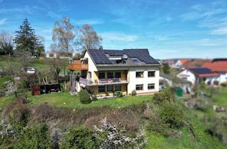 Haus kaufen in 35091 Cölbe, Wohnen & Investieren: 3-Parteienhaus mit großem Grundstück und unverbaubarem Ausblick