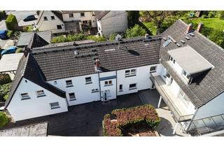 Mehrfamilienhaus kaufen in 65201 Dotzheim, Gepflegtes Mehrfamilienhaus in guter Wohnlage mit 4 Wohnungen und großem Garten