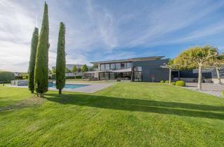 Villa kaufen in 55234 Erbes-Büdesheim, Ein Statement jenseits des Gewöhnlichen – Luxusvilla mit Resort-Charakter
