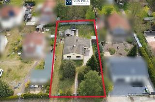 Einfamilienhaus kaufen in 15806 Zossen, Solider Bungalow am Waldrand mit großem Garten und Kaminofen