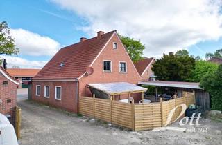 Haus kaufen in 26670 Uplengen, +++ Vermietetes Zweifamilienhaus in zentraler Ortslage von Hollen - Bruttorendite ca. 5,28 % +++