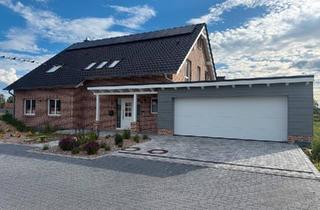 Einfamilienhaus kaufen in 29399 Wahrenholz, Wahrenholz - Einfamilienhaus mit Doppelgarage in Wahrenholz