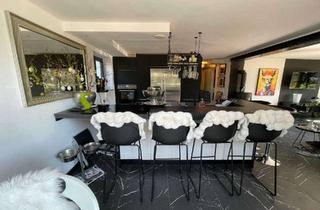 Wohnung kaufen in 96135 Stegaurach, Moderne, sanierte 2,5-Zimmer-Erdgeschosswohnung mit schönem Wintergarten und Terrasse