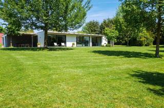 Haus kaufen in 97440 Werneck, Bungalow der Extraklasse – Stilvolle Ruheoase für höchste Ansprüche