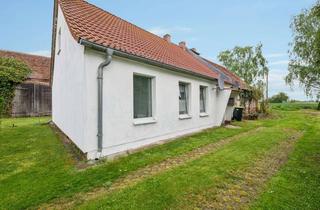 Haus kaufen in 14662 Mühlenberge, Charmantes Reihenendhaus mit großem Grundstück und Entwicklungspotenzial