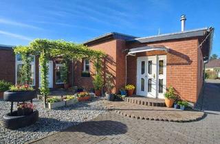 Haus kaufen in 39288 Burg, Ebenerdiger Bungalow mit Wintergarten, Gartenhaus und zwei Wohneinheiten – vielseitiges Wohnen auf g