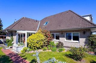 Einfamilienhaus kaufen in 26180 Rastede, Charmantes Einfamilienhaus mit Garage, Einliegerwohnung und schönem Garten direkt in Rastede!