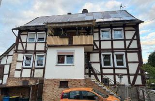 Haus kaufen in 34576 Homberg, Homberg (Efze) - Zweifamilienhaus mit Photovoltaikanlage und guter Rendite