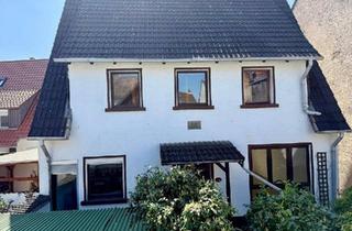 Einfamilienhaus kaufen in 64625 Bensheim, Bensheim - Freistehendes Einfamilienhaus in Schwanheim mit Garten