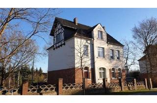 Haus kaufen in 03103 Neupetershain, Neupetershain - Zweifamilienhaus mit bezugsfrei werdender Erdgeschosswohnung