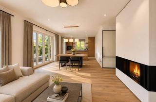 Wohnung kaufen in 83700 Rottach-Egern, Exklusive Gartenwohnung – Privater Südgarten, Altholzfassade und nur wenige Schritte zum Tegernsee