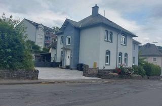 Doppelhaushälfte kaufen in 54550 Daun, Charmante modernisierte Doppelhaushälfte mit ruhigem Garten und viel Platz für Familienleben