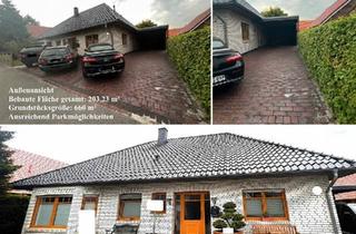 Einfamilienhaus kaufen in 26655 Westerstede, Westerstede - Exklusiver Walmdach-Bungalow mit Gewerbeeinheit