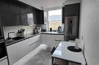 Wohnung kaufen in 40880 Ratingen, Ratingen - Helle modernisierte Wohnung in Ratingen mit Fußbodenheizung