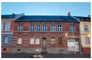 Mehrfamilienhaus kaufen in 39288 Burg, Burg - Mehrfamilienhaus mit Grundstück und Gewerbeeinheit im Erdgeschoss