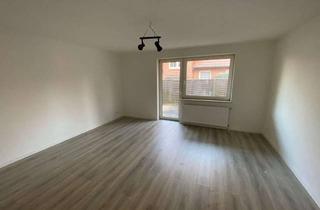 Wohnung kaufen in Adlerweg, 26639 Wiesmoor, Attraktive 3-Zimmer-Erdgeschosswohnung mit eigener Terrasse und Schuppen