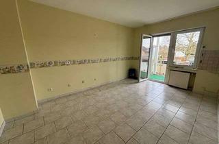 Wohnung kaufen in 41363 Jüchen, Helle Eigentumswohnung im Herzen von Hochneukirch mit Garage und alleiniger Gartennutzung