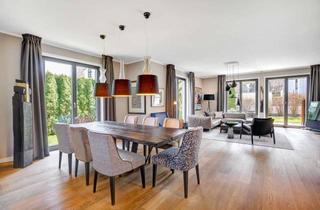 Wohnung kaufen in 81927 Bogenhausen, Haus-im-Haus: Großzügiges Domizil in stylischer Design-Ästhetik mit sonnigem Garten