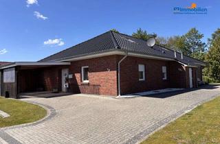 Haus kaufen in 26532 Großheide, Vermietetes Doppelhaus in zentraler Sackgassenlage