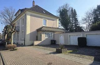 Doppelhaushälfte kaufen in Wilhelmstraße 69, 41812 Erkelenz, Zwei Familien-Doppelhaushälfte, Mehrgenerationenhaus oder ein Geschäftssitz.