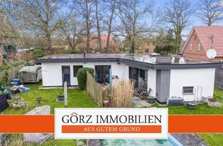 Haus kaufen in 24641 Hüttblek, ***Schöner Winkelbungalow mit Pool und Doppelgarage in Feldrandlage!***