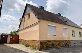 Doppelhaushälfte kaufen in 06846 Kleinkühnau, Eine Doppelhaushälfte wartet auf neue Bewohner