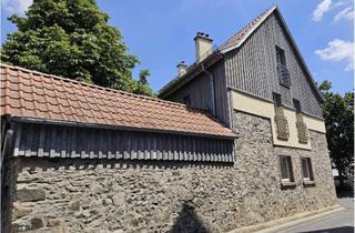 Haus kaufen in 64342 Seeheim-Jugenheim, Vielseitiges Wohn- und Geschäftshaus mit 3 modernen Wohnungen und Restaurant