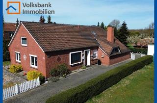 Einfamilienhaus kaufen in 26817 Rhauderfehn, Wohnen am Fehnkanal - Modernisiertes EFH mit großem Grundstück und vielseitigen Nebengebäuden