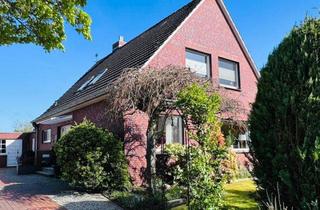 Einfamilienhaus kaufen in 26725 Emden, Wohnen mit Raum & Ruhe: Erweitertes Einfamilienhaus mit Garage und Gartenanlage
